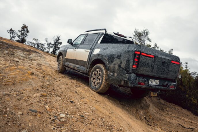 Nissan Navara Pro PHEV prototype rear view on a climb
