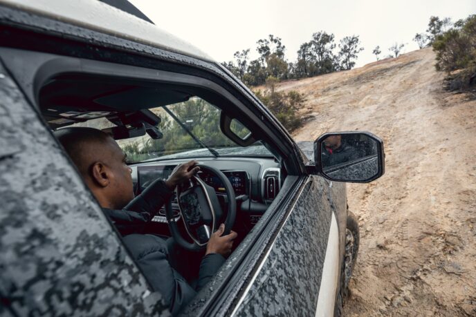 Driver at the wheel of the Nissan Navara Pro PHEV prototype
