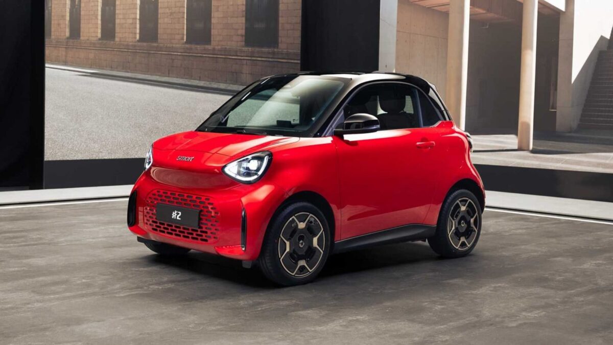 Red smart #2 electric two-seater, front three-quarter view