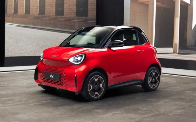 Red smart #2 electric two-seater, front three-quarter view