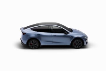 Side view of a Tesla Model Y Performance in Glacier Blue