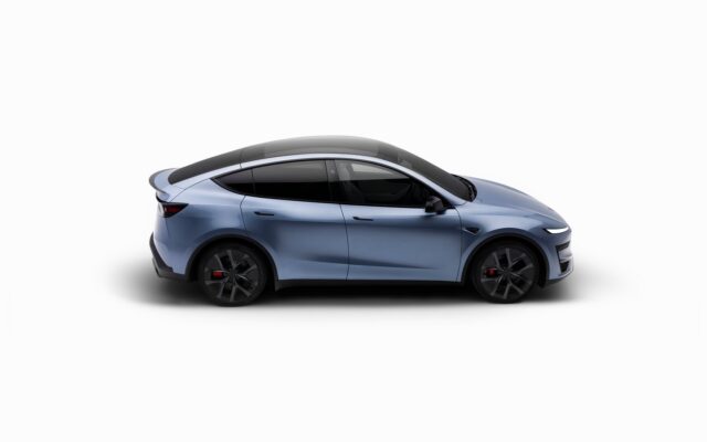 Side view of a Tesla Model Y Performance in Glacier Blue