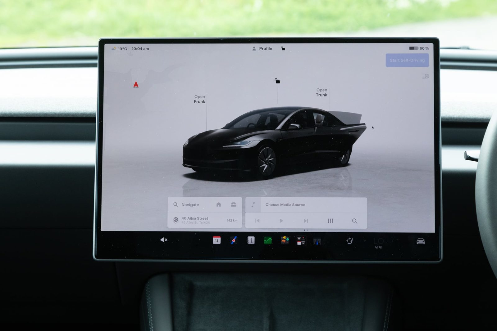 Tesla Model 3 touchscreen showing the vehicle menu