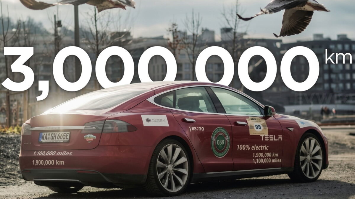 Red Tesla Model S P90 with a 3,000,000 km graphic