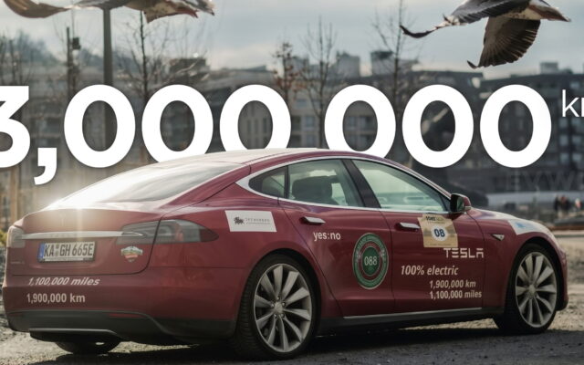 Red Tesla Model S P90 with a 3,000,000 km graphic