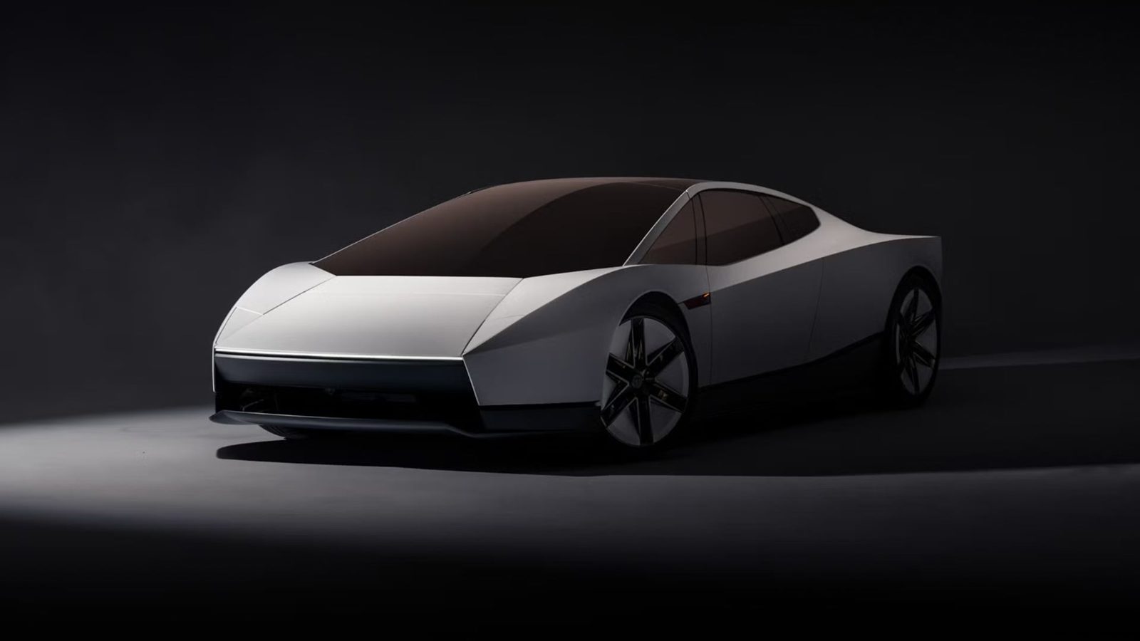 White second-generation Tesla Roadster front three-quarter view in a dark studio