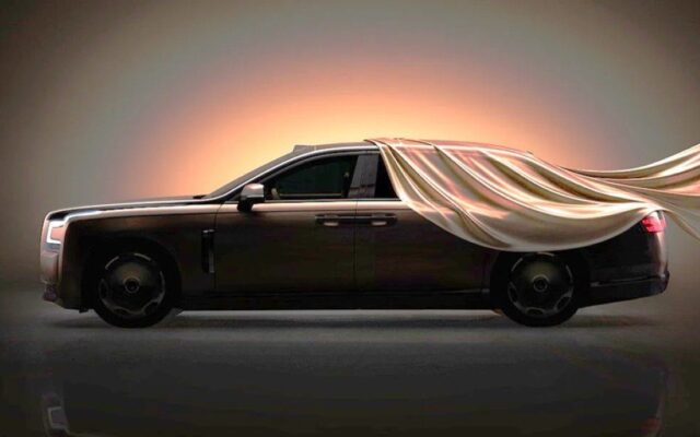 Yangwang Altior luxury sedan teaser image in profile, partly covered by a silk sheet